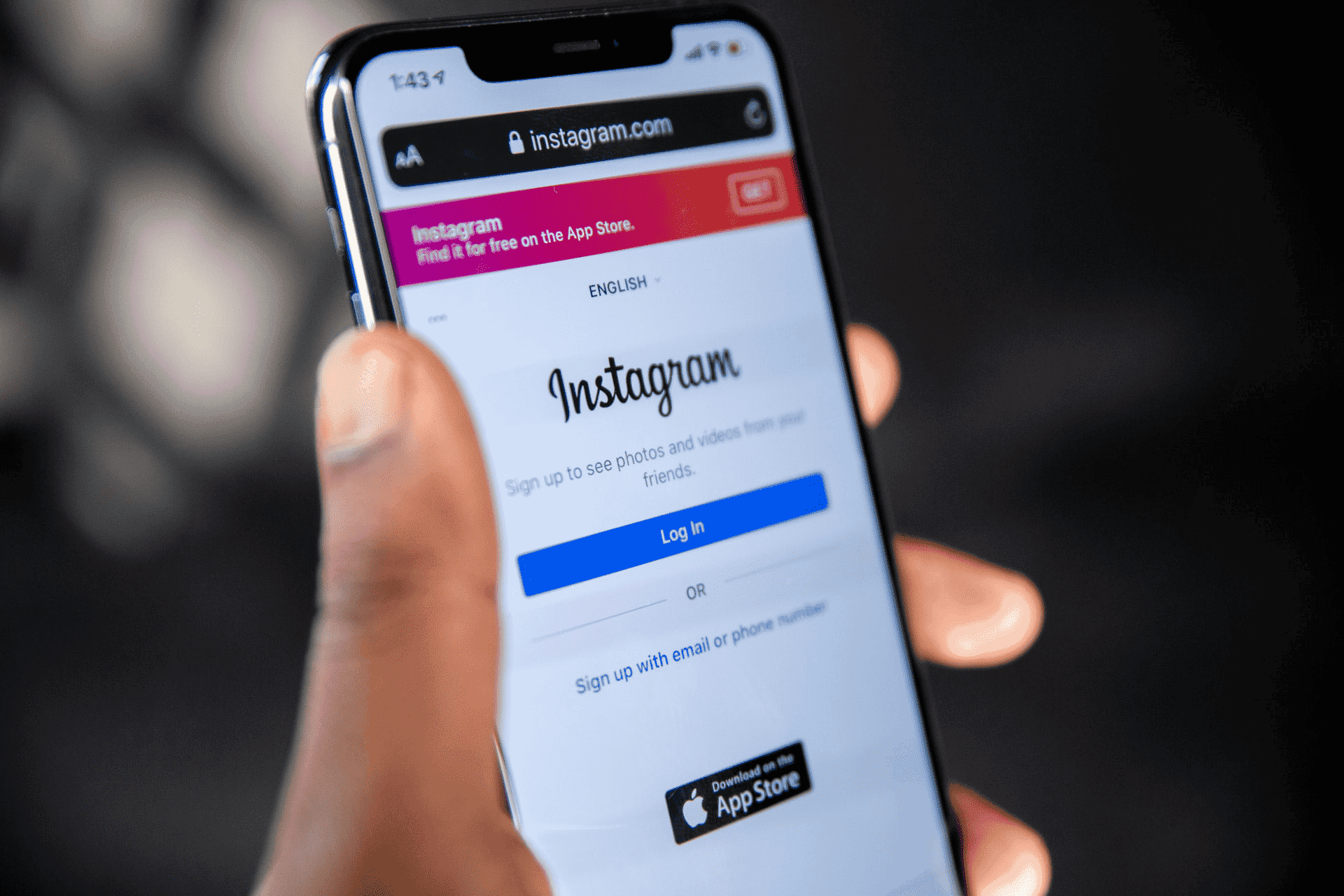 Phone showing Instagram login page